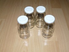 4 kleine Flaschen mit Deckel - Höhe ca. 10 cm