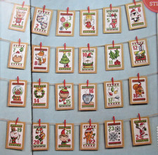 Stickvorlage "24 weihnachtliche Anhänger - Adventskalender" 24 Kreuzstichmotive