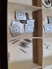 Aufzugfeder,  ZAHNRAD AUFZUGWELLE CAL 23 11 1/2, Zifferblatt BRITIX NOS