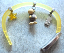 NICI Armband gelb / silberfarbend Motiv Löwe und Affe gestempelt/signiert Nr.489