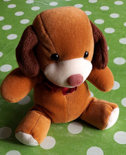 Hund sitzend Plüschtier