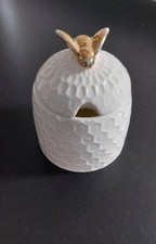 Honigtopf mit goldener Biene