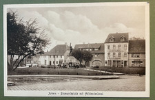 AK Artern, Bismarckplatz mit Heldendenkmal, Laden Schmidt, Thüringen um 1920