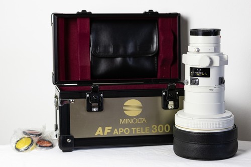Minolta 300 mm - minolta, a)