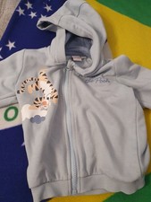 Hellblaue Jacke mit Kapuze