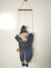 Harlekin Puppe Auf Schaukel