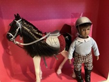 Lori Puppe Landon Mit Pferd