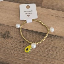 Goldenes Perlenarmband mit