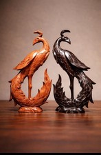 2 handgeschnitzte Holzvögel