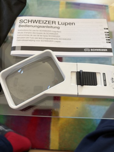 Lupe mit licht schweizer - licht,