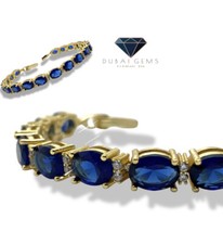 Gelbgold Tennisarmband blauer