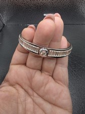 Henri Bendel silberfarbenes