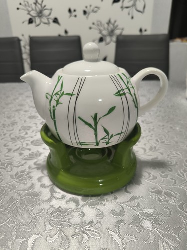Teekanne mit stövchen - teekanne,