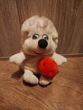 Rosa Igel mit rotem Pilz in