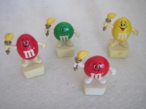 4 kleine werbefiguren - -,