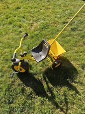 Dreirad für Kinder mit Stange von der Firma Puky in gelb und schwarz