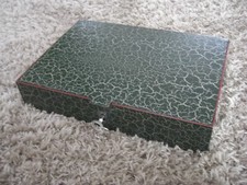 Alte flache Geldkassette