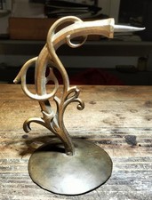 Antiker Kerzenwandhalter