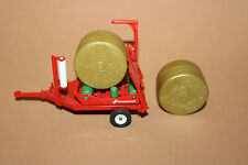 Siku Farmer   1:32 2266 Rundballenwickler  mit 2 Goldene Ballen rot  