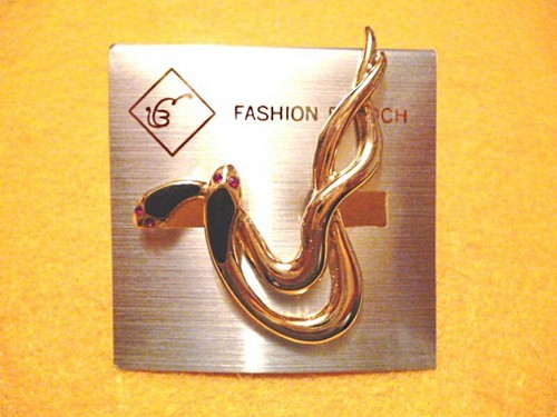 Goldfarbene brosche - (01574),
