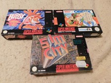 3 Super Nintendo Spiele Bubsy Asterix & Obelix und Sim City in OVP - SNES