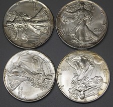 4 x Silbermünzen USA One Dollar American Eagle je 1oz Silber 1987,1990,1994,1996