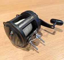 Shimano TLD 25 Meeresangelrolle mit Rutenklemmen gebraucht 