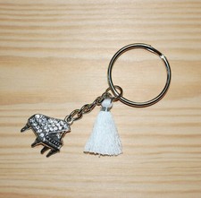 Schlüsselanhänger Taschenanhänger funkelnder Flügel/Klavier, Quaste Weiß/Silber