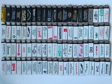 Konvolut 84 weiße schwarze Werbe-Feuerzeuge TOKAI PROF Vintage Einwegfeuerzeug