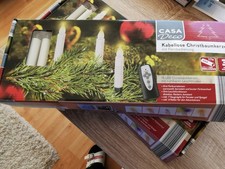 Weihnachten steht vor der Tür. ZweiPackungen Christbaum Kerzen mit Fernbedienung