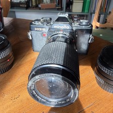 Minolta XG 9 mit 4 Objektiven