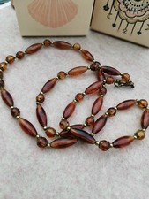 Ethno-Schmuck Modeschmuck Kette aus Bernsteinimitat Metallteile dunkelmessing