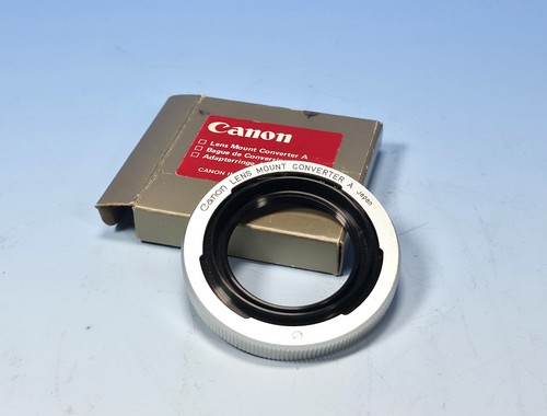 Canon lens mount converter - lens, a