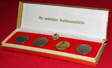 DDR: 4 Medaillen, ein Abzeichen + Urkunde "Für vorbildliche Nachbarschaftshilfe"