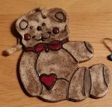 Wandbild Teddy aus braunem Ton