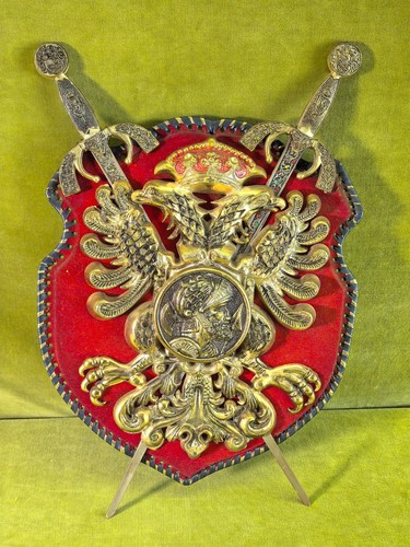 Wappen mit gekreutzten