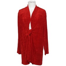 L'Impossible, Strickjacke