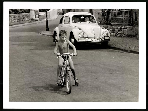 Fotografie knabe auf fahrrad - fotografie,