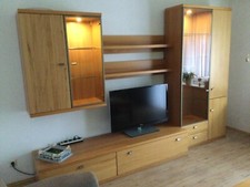 Schrankwand 2,15 m breit und Sitzgruppe in Mikrofaser Steingrau.