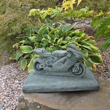 Steinfigur Motorrad Krad