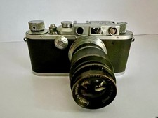 Leica Nr: 231143 D.R.P. mit Elmar f= 9cm / 4 Nr: 635806 und Kameratasche 