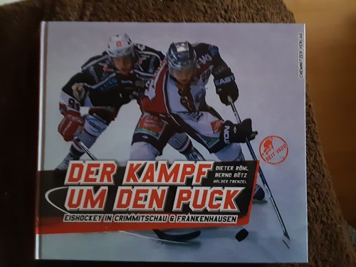 Der kampf den puck - um,