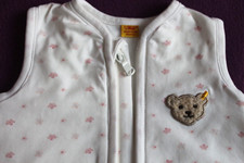 STEIFF Schlafsack New Born in weiß mit Rosablümchen 56cm