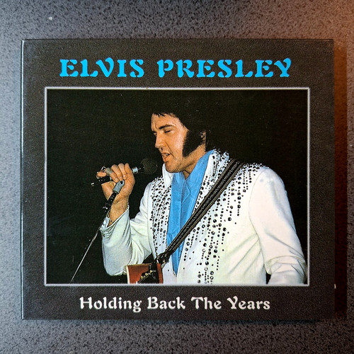 Elvis presley holding back - elvis,