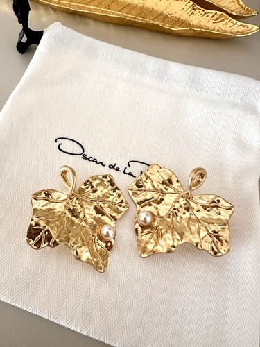 Oscar renta gold - la,