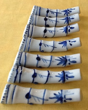 7 Porzellan Messerbank