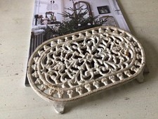 Alter Untersetzer Gusseisen