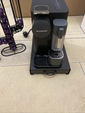 De'Longhi Lattissima One Kapselmaschine - Schwarz Inkl. 150 Kapseln und Zubehör