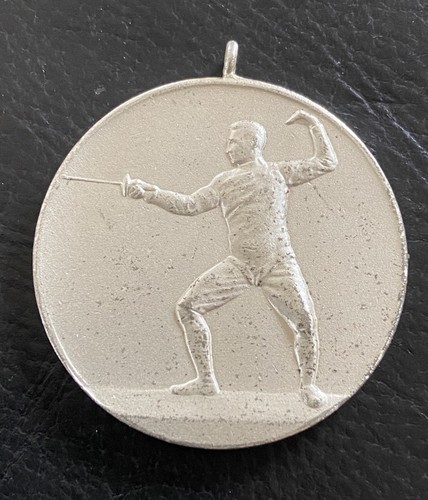 Alte silberfarbene medaille - alte,