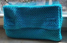 Handgehäkelte Clutch Tasche